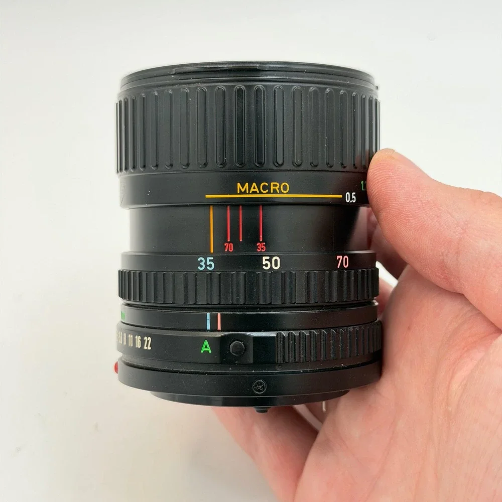 Canon Zoom Lens FD 35-70mm 1:3.5-4.5 Macro Film Camera Lens W/ Tiffen UV Filter